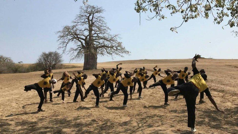 People practicing Capoeira Angola