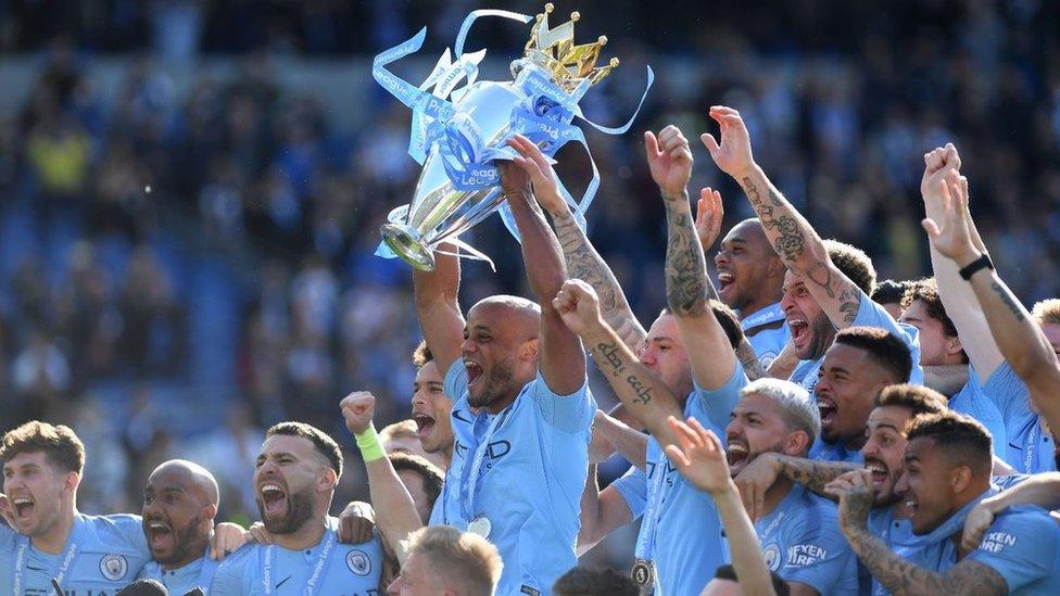 Manchester City celebrate winning Premier League