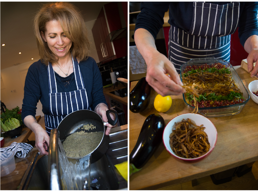 Majeda preparing harra esbou, made with lentils, pasta, tamarind, pomegranate, onions and garlic