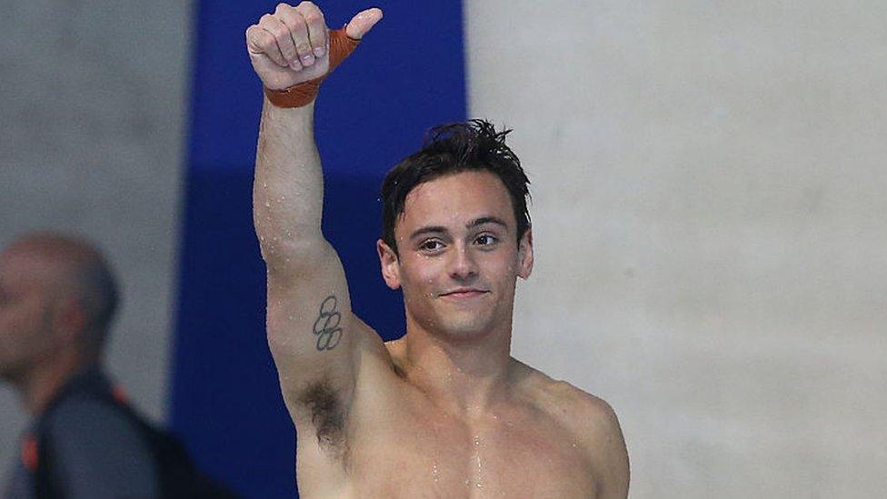 Britain's Thomas Daley celebrates after taking gold in the final of the men's Platform diving event on Day 7 of the European aquatics championships in London on May 15, 2016