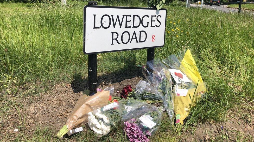 Floral tributes have been left in Lowedges Road