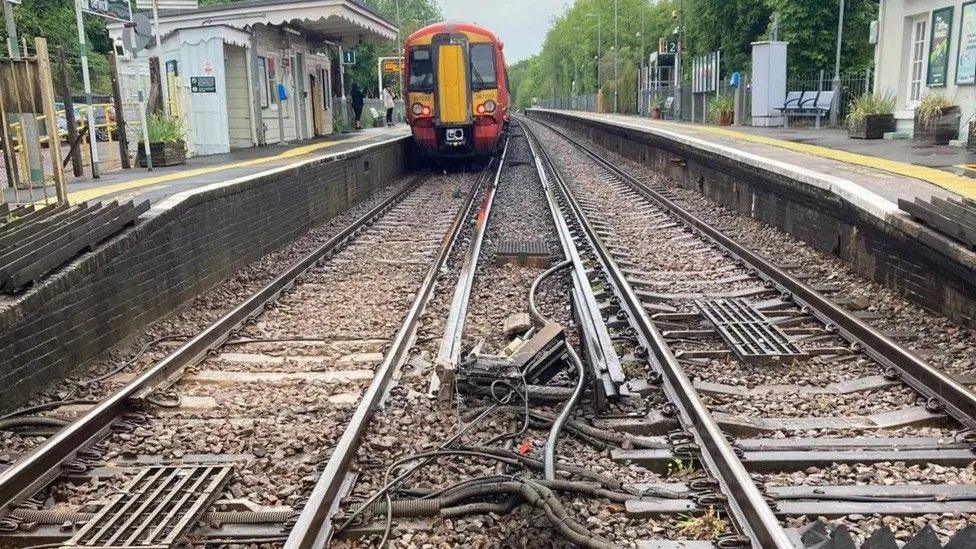 Damaged barriers on railway track 