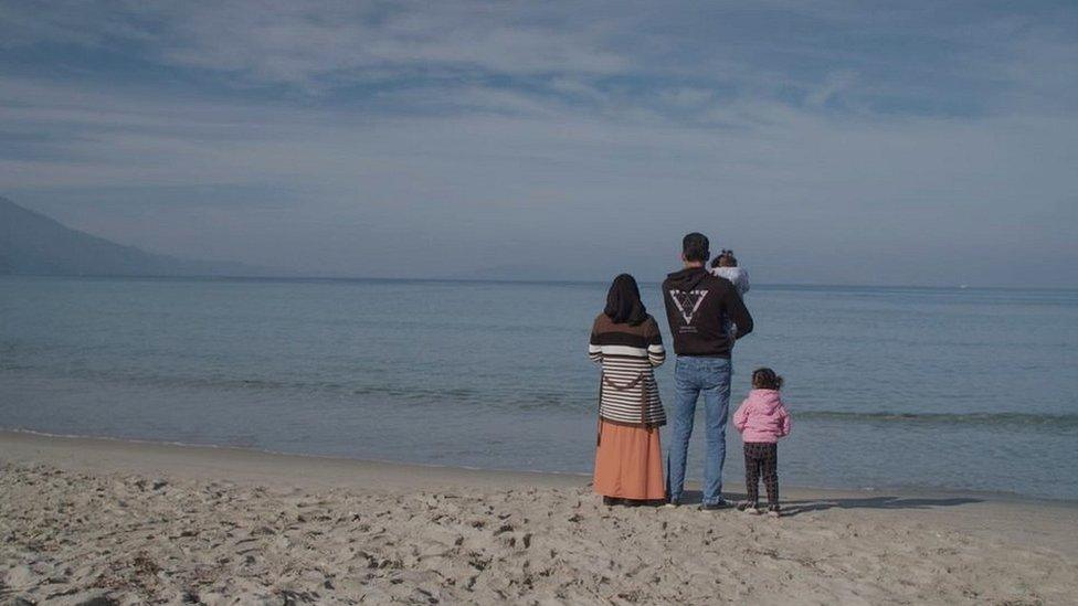 Halil with his wife and two of his children