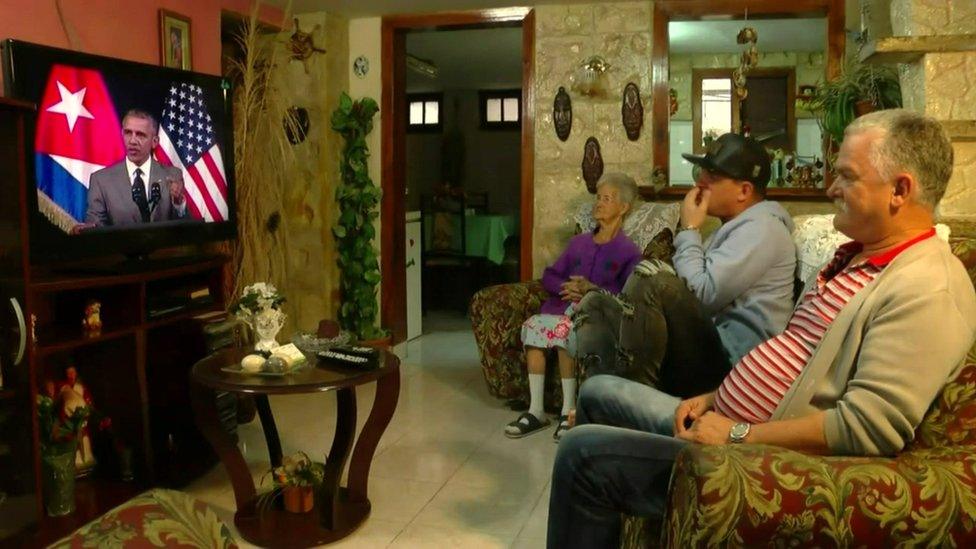 Cubans watching Obama's address on TV