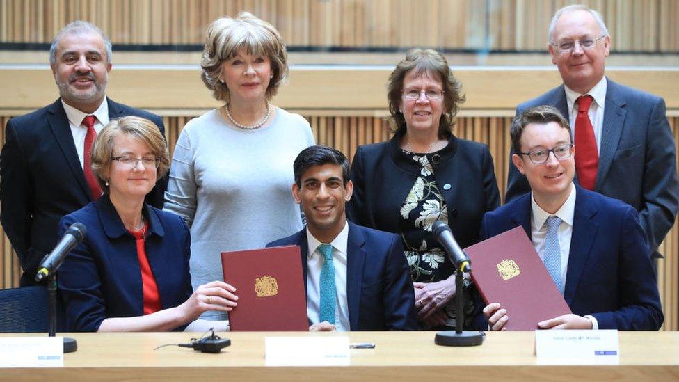 (back row, left to right) Councillors Shabir Pandor, Denise Jeffery, Judith Blake and Tim Swift, (front row, left to right) Susan Hinchcliffe, Chancellor Rishi Sunak and Simon Clarke MP after the signing of the West Yorkshire Combined Authority devolution, at the Nexus Building at the University of Leeds on March 12, 2020 in Leeds