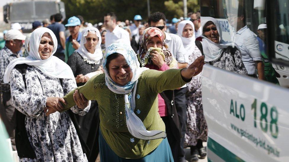 Relatives of Gaziantep victim Kumri Ilter after a funeral ceremony in Gaziantep (22 August)