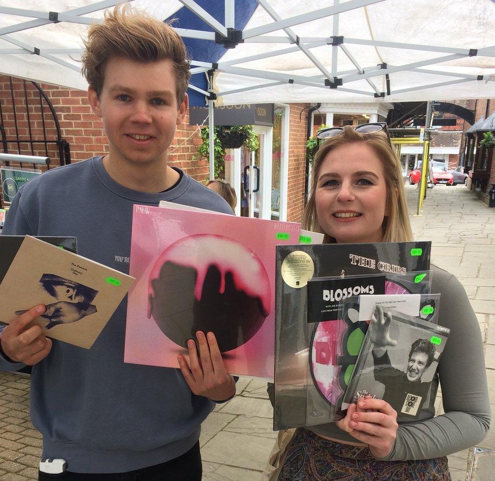 Amy and Michael pose with their vinyl haul