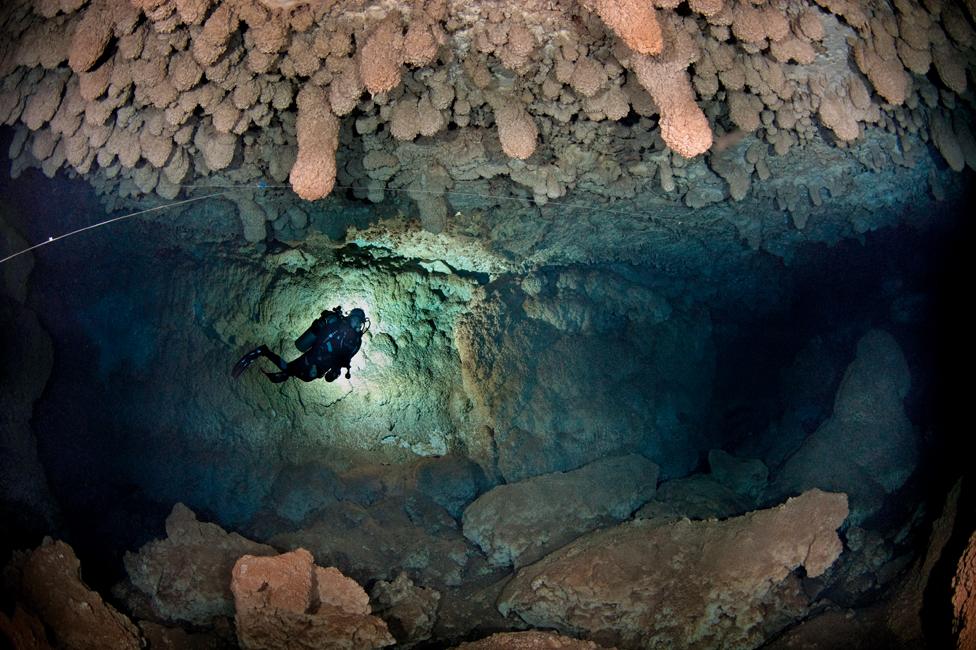 Xisco diving in Mallorca's submerged caves