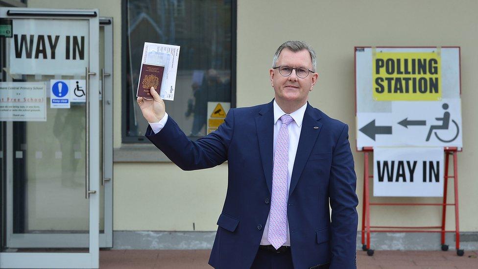 Jeffrey Donaldson at a polling station