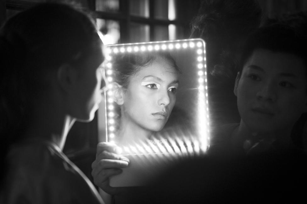 A model backstage ahead of the Huishan Zhang show during London Fashion Week February 2019