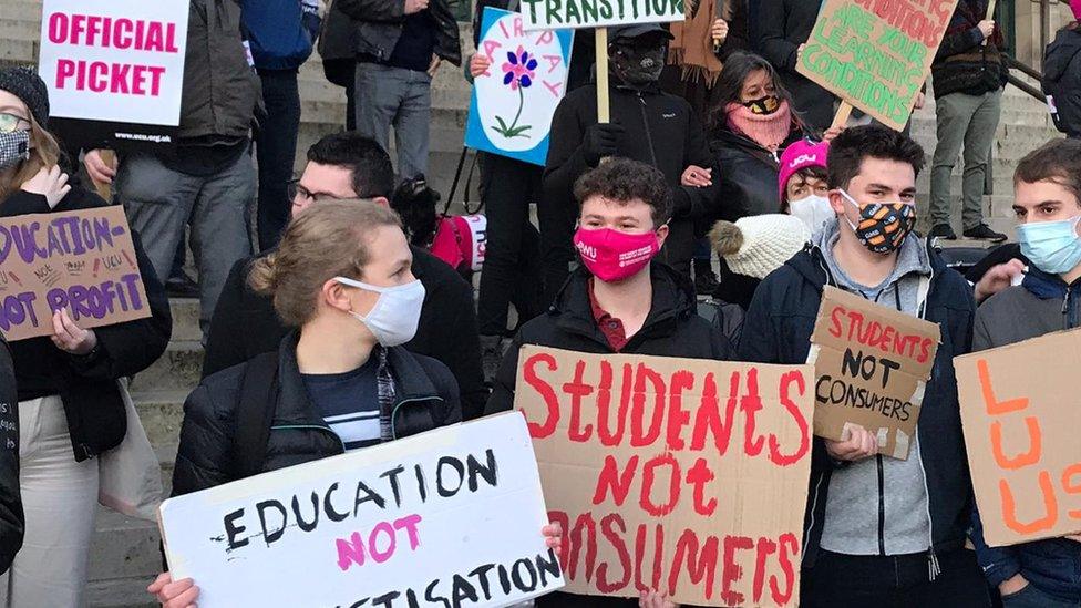 People holding placards in Leeds