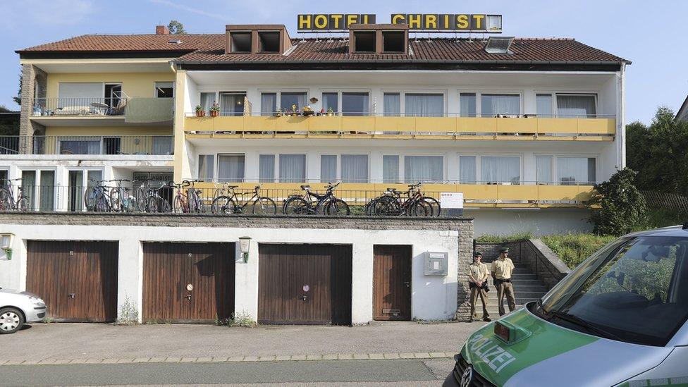 Police guard the hotel where the Ansbach bomber lived, 25 July