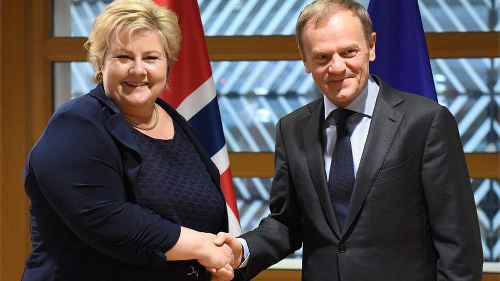 Norway's Prime Minister Erna Solberg and Donald Tusk