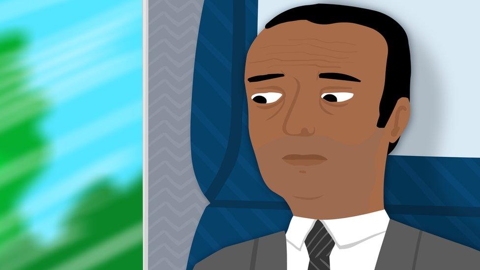 Cartoon of depressed businessman looking out window