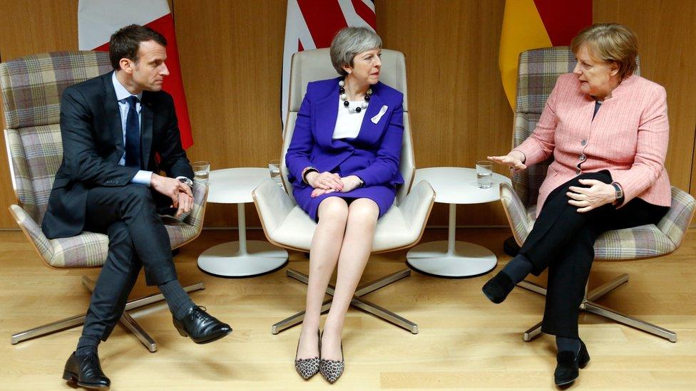 Emmanuel Macron, Theresa May and Angela Merkel