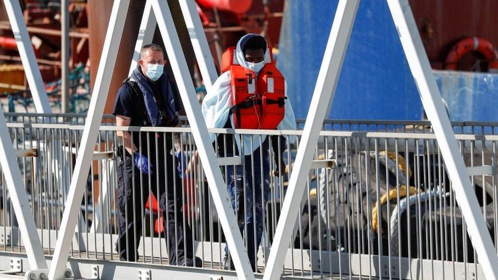 A man being brought ashore in Dover on Thursday