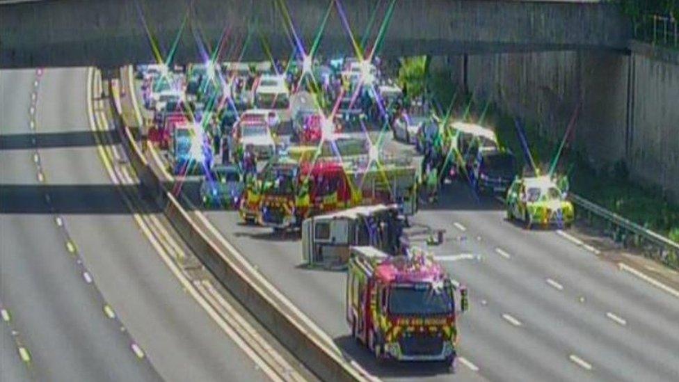 Overturned campervan on M27