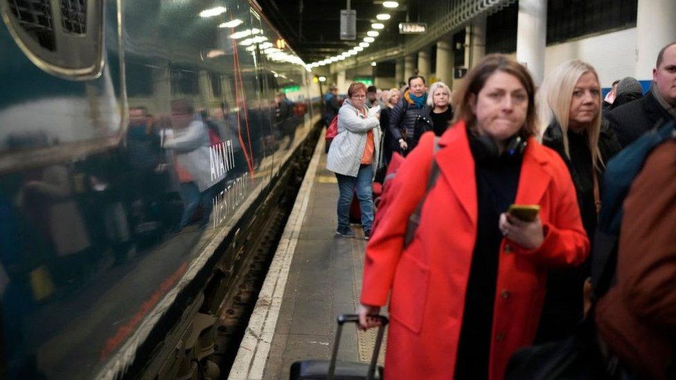 Passengers leaving a train