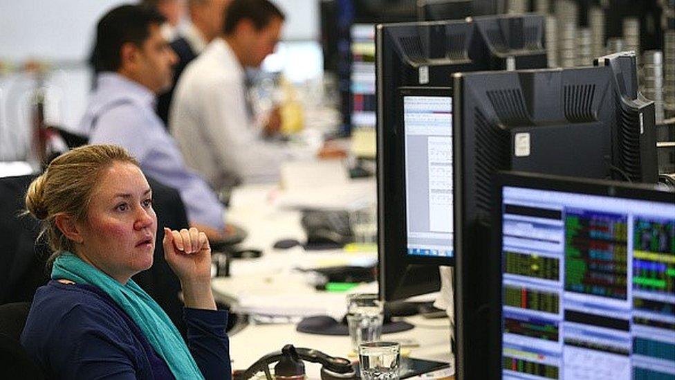 Woman at Bloomberg terminal