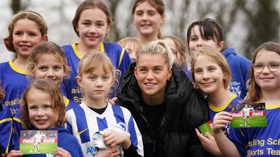 Alessia Russo meets young footballers at the pitch where she started playing as an 8-year-old.