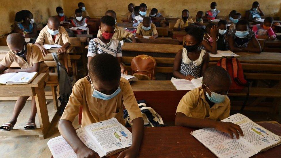 children in classroom.