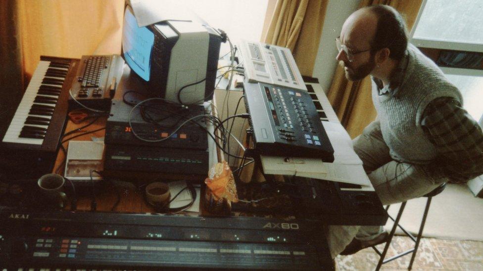 Mike Tedder with his synthesisers in his front room