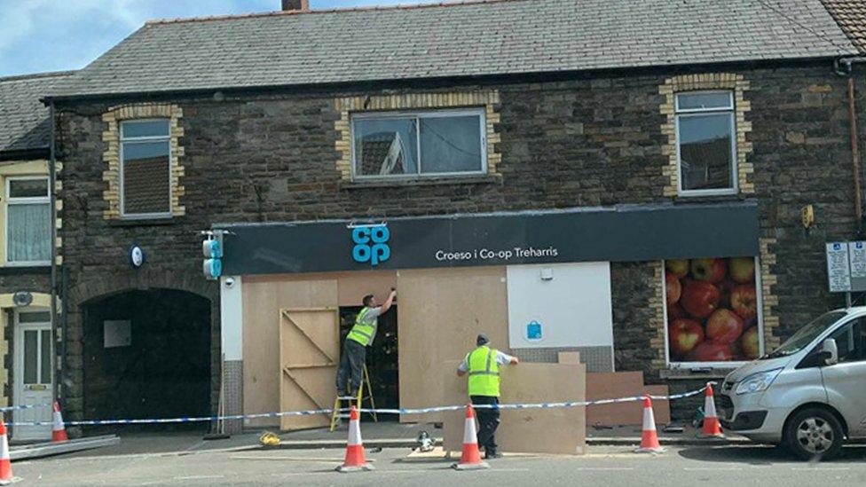 Repairs on the damaged store frontage