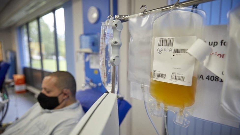 Undated handout photo issued by NHS Blood and Transplant showing a man donating convalescent plasma