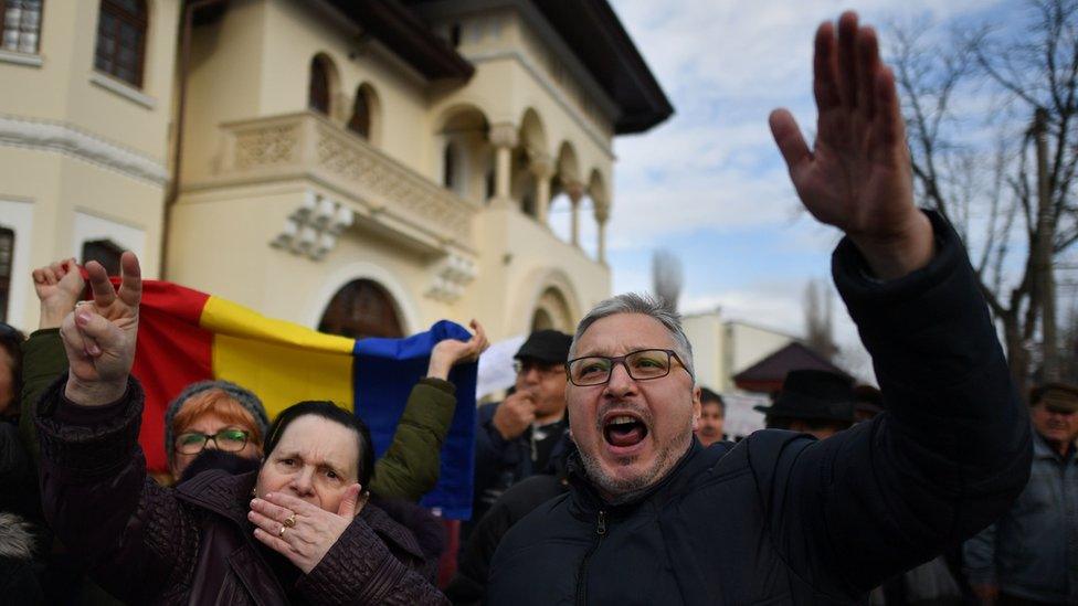 pro-government supporters outside the presidential residence, Cotroceni Palace, in Bucharest on 5 February