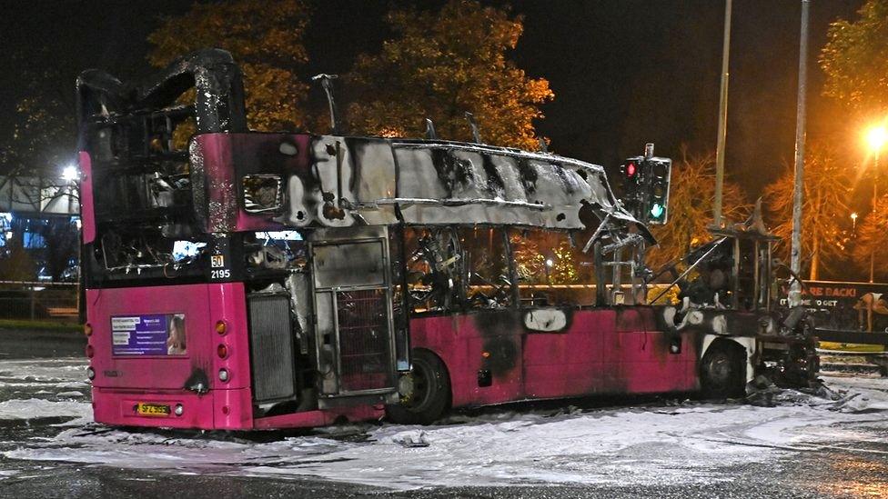 Burnt wreckage of a Metro bus in Rathcoole