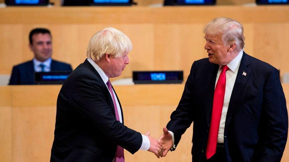 Boris Johnson (L) and US President Donald Trump greet before a meeting on United Nations Reform at UN headquarters in New York on September 18, 2017