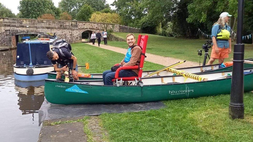 Matt on a canoe