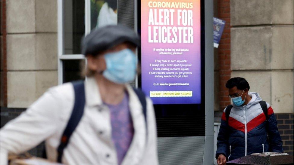 People in masks in Leicester