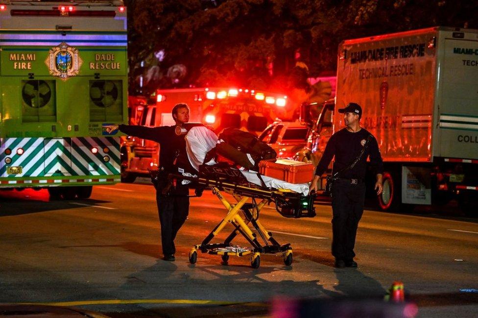 First responders arrive at a partially collapsed building in Miami Beach, Florida, on June 24, 2021.