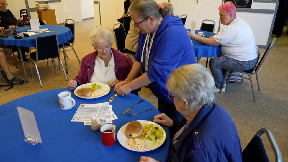 People at community café