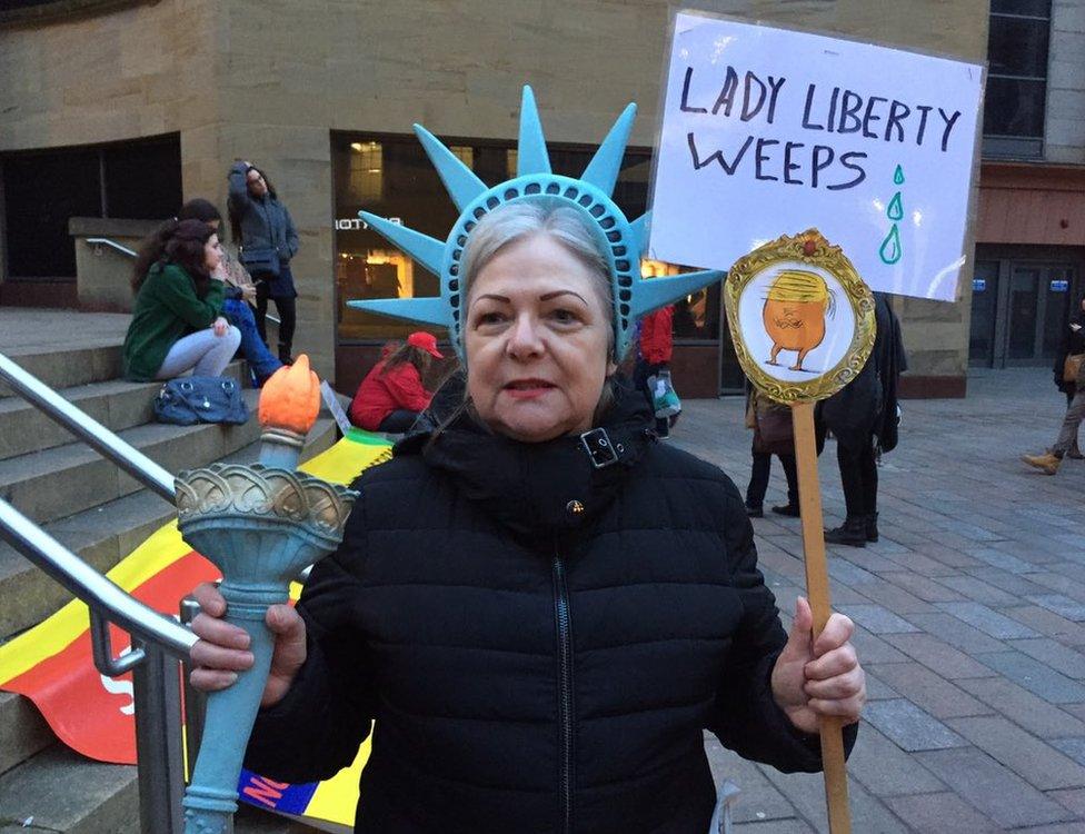 The BBC's Lorna Gordon says this lady from Georgia says she's angry and ashamed about the President's travel ban.