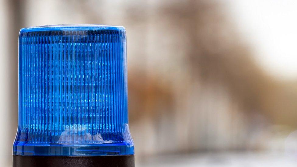 A blue police light