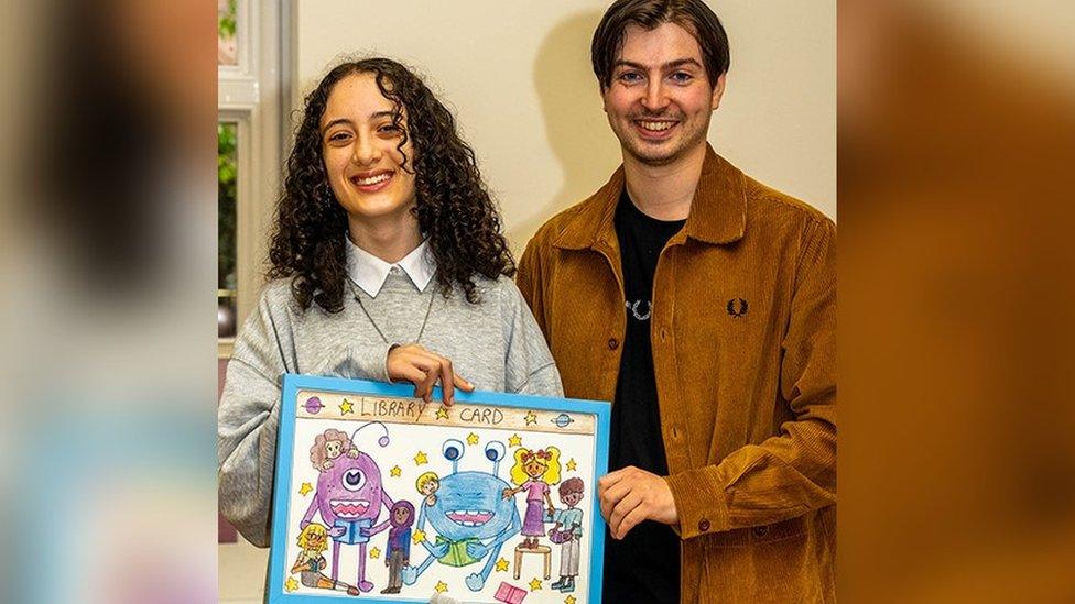 Diyar with judge and illustrator Ian Morris