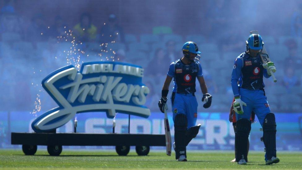 Jake Weatherald and Alex Carey walking out to bat