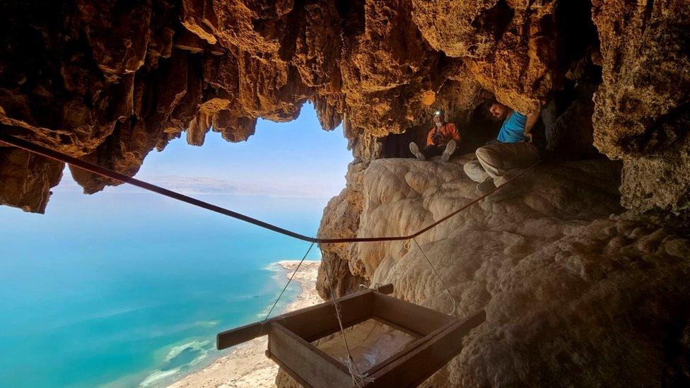 At work in the cave. Photography Oriya Amichai, Israel Antiquities Authority