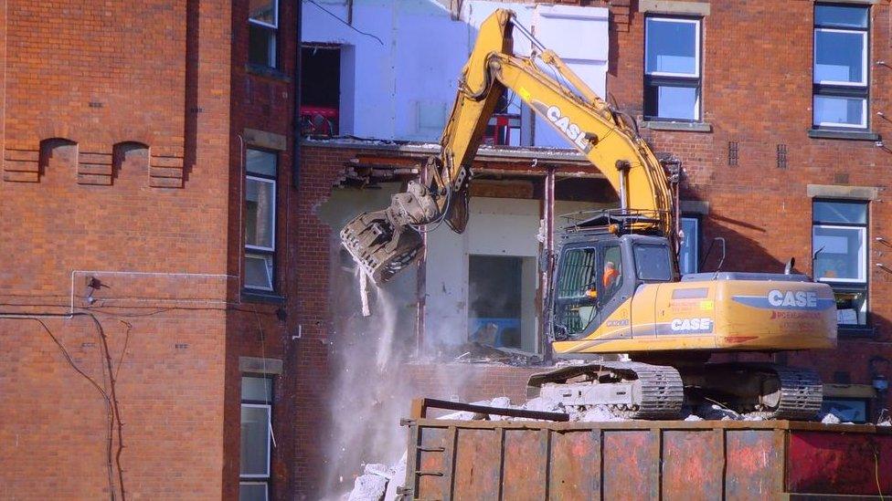 Demolishing the hospital