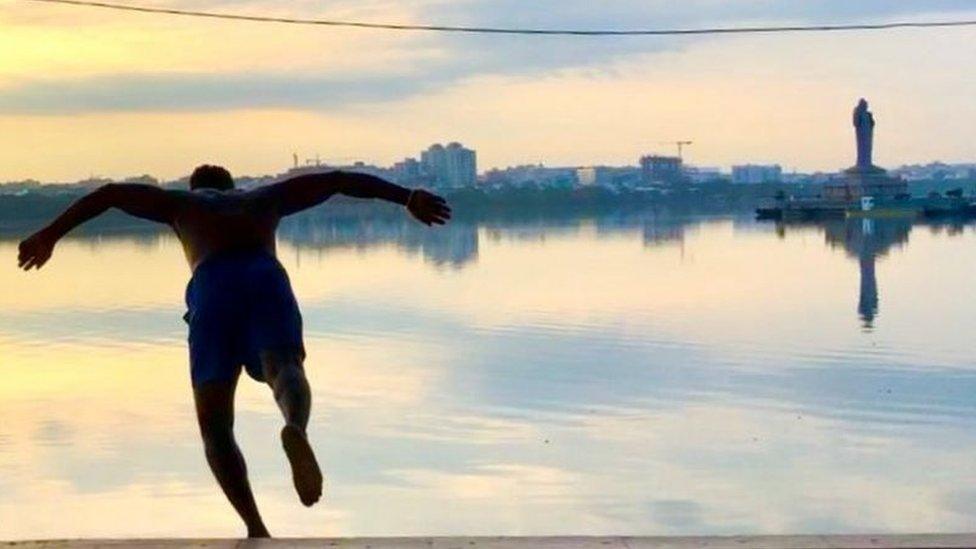 Shiva jumping into the lake