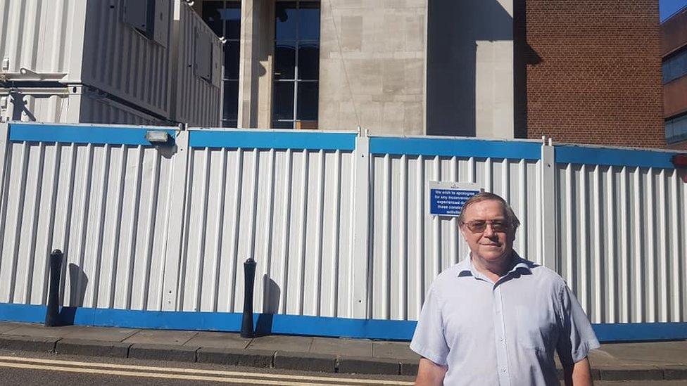 Dennis Price outside the Civic Hall in Wolverhampton