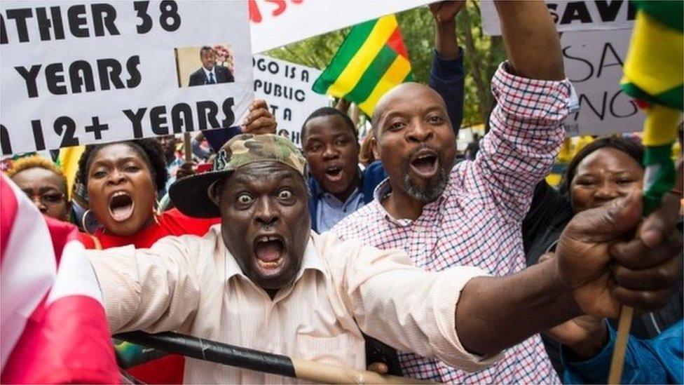 Abdou Razak (C) of Togo demonstrates with others against President Faure GnassingbÃ© in Dag Hammarskjold Plaza outside the UN in New York on September19, 2017