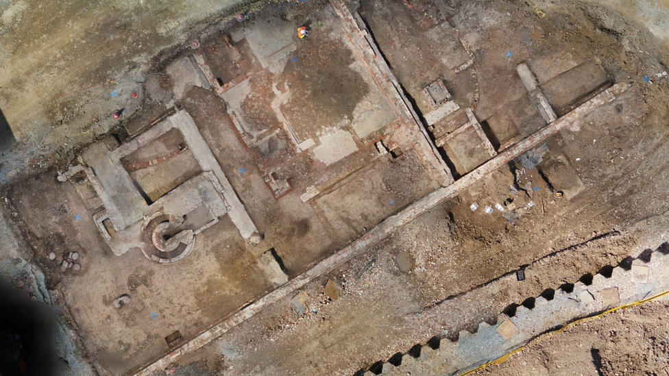 Ariel view of the foundries, the burial ground's gaolyard wall, and traces of the gaol