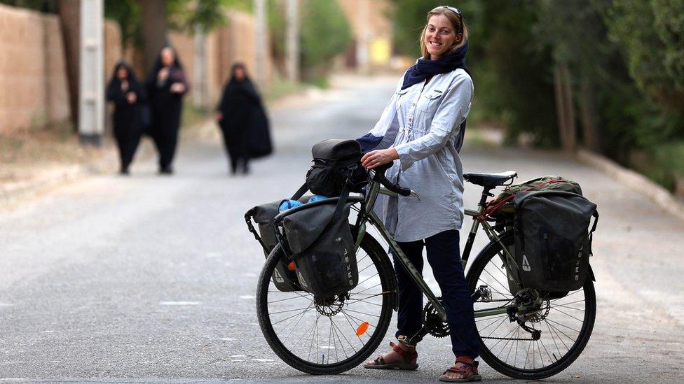 Rebecca Lowe with her bicycle in Iran