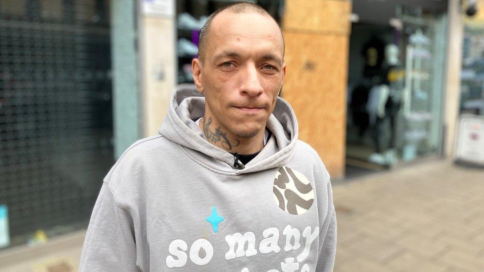 Ashley Brown standing outside his shop in Broadmead in Bristol city centre