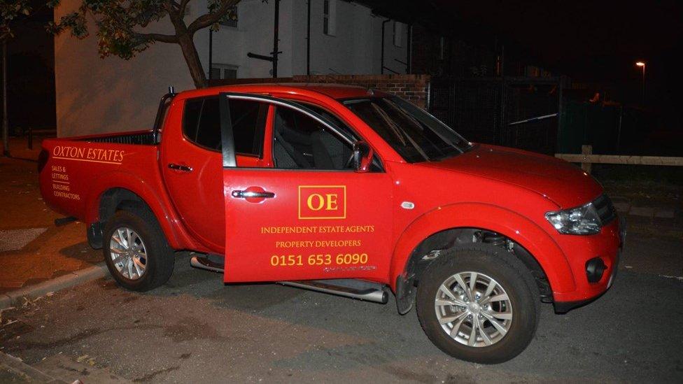 The red Mitsubishi pick-up involved in the incident.