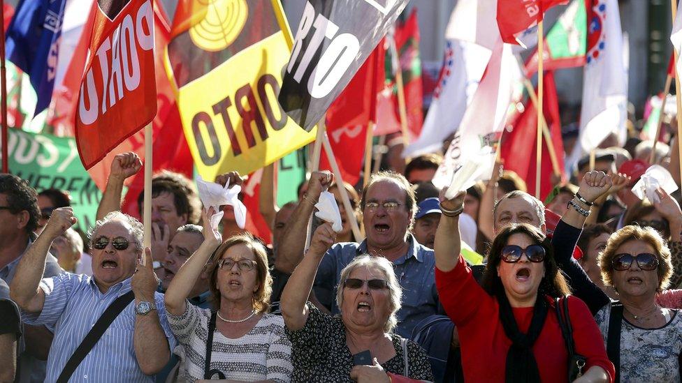 Protesters outside parliament call for the fall of the centre-right minority government (10 Nov)