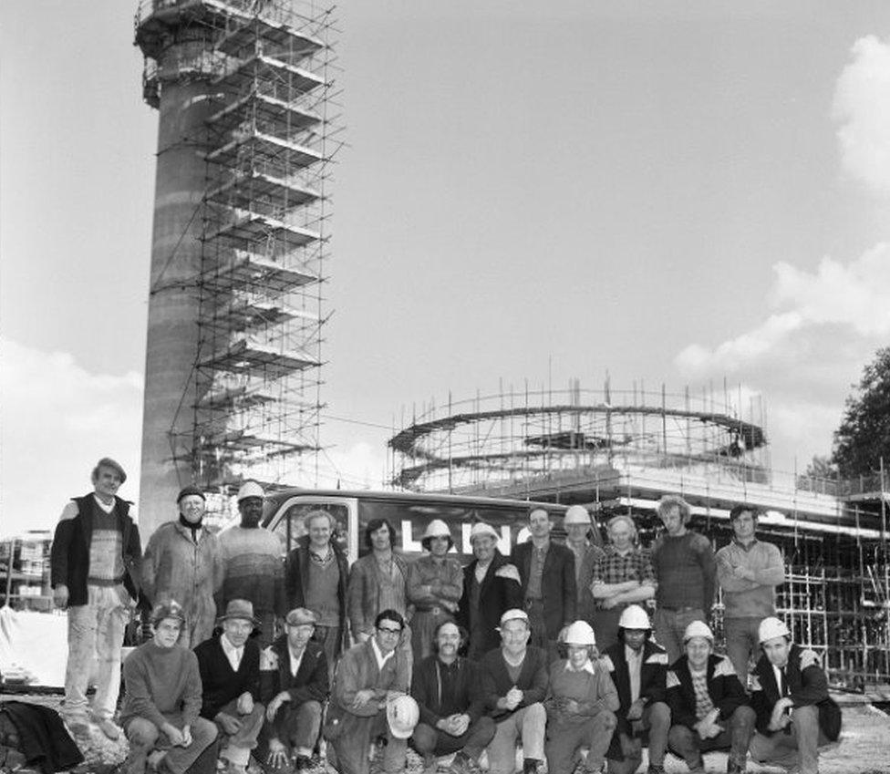 Construction crew outside mosque